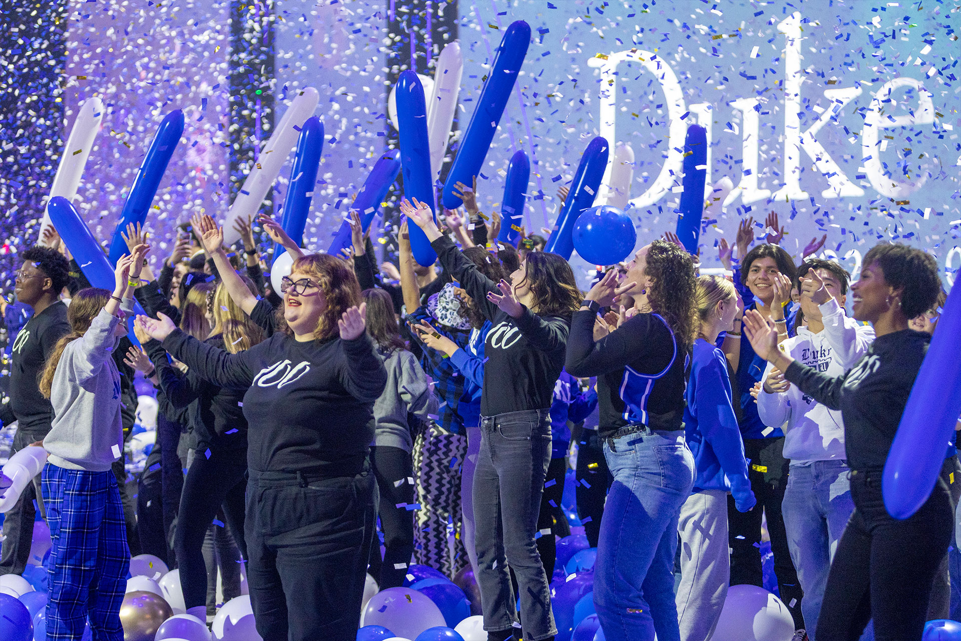 Student performers sing along with “Everytime we touch” as confetti falls