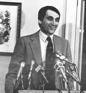 A historical photo of Coach K at a press conference