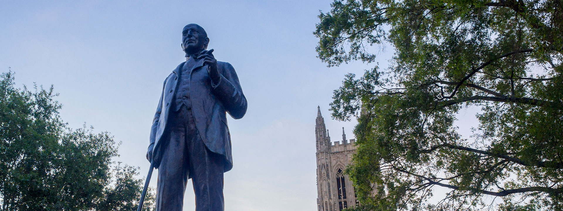 James B. Duke statue in front of Duke Chapel during blue hour