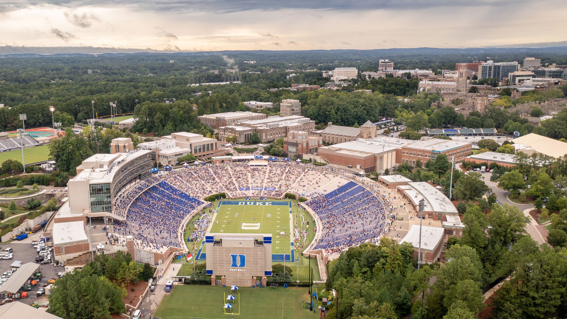 A current photo of Wallace Wade stadium with a built up campus