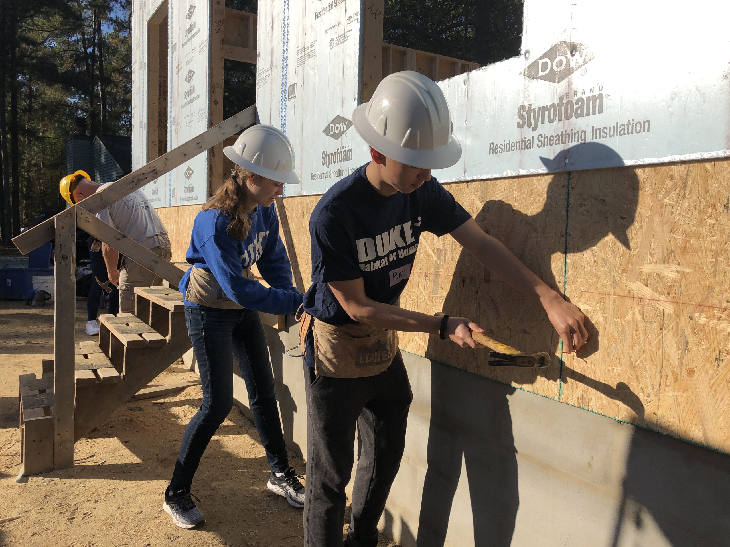 Duke volunteers participate in a volunteer shift for Habitat for Humanity