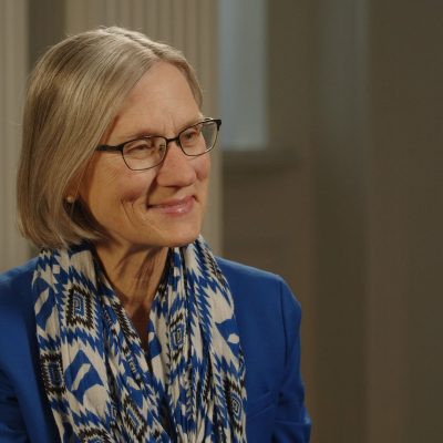 Dean Sue Wasiolek smiling while being interviewed