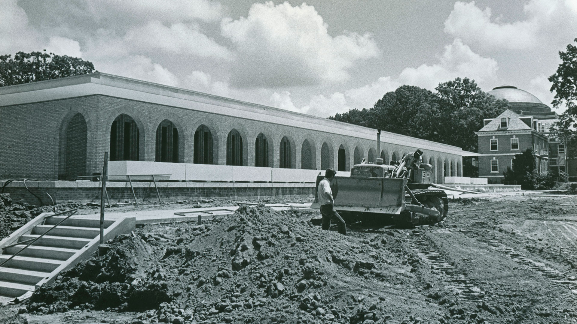 A black and white photo of the Music Building under construction on East Campus